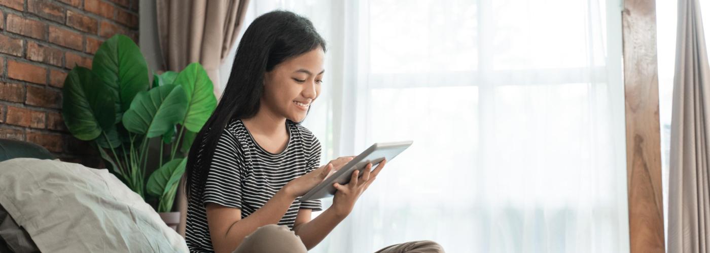 Woman on tablet.