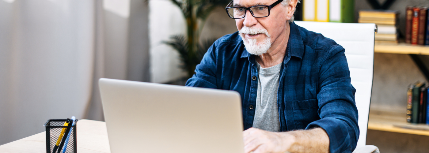 Man on computer.