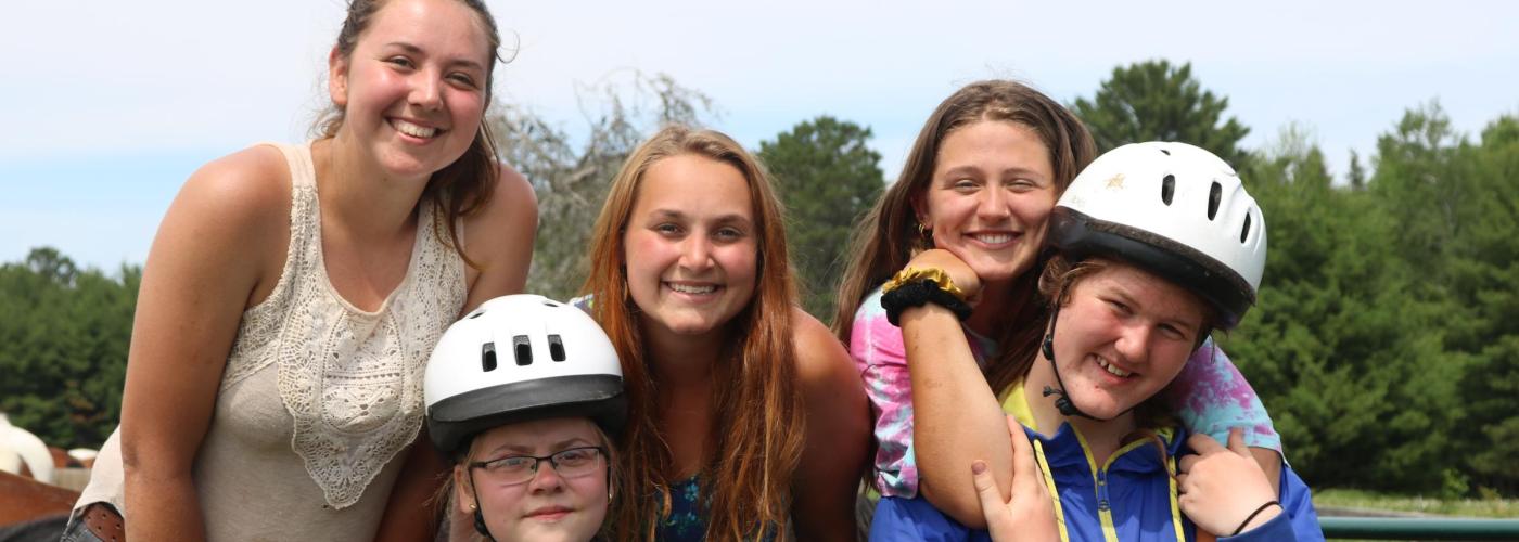 Group of horseback riding students. 