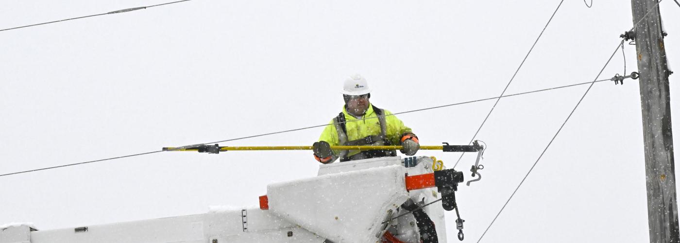 Crow Wing Power lineworker restoring power during a winter storm. 